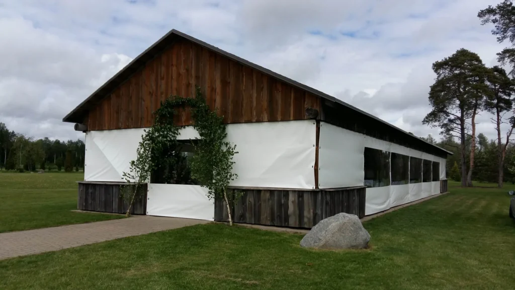 Outdoor covered area with sliding walls